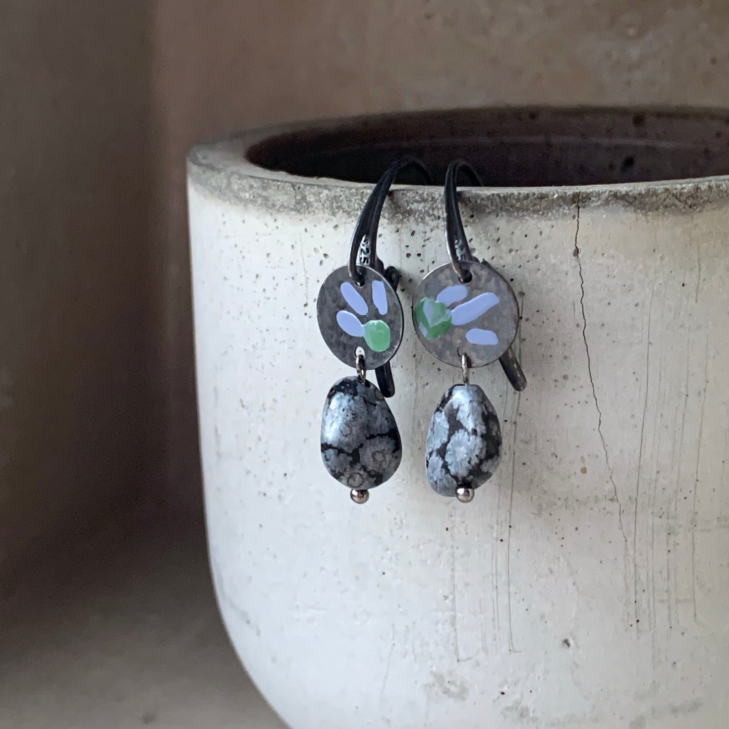 Earrings in silver and obsidian, with hand-enameled flowers 'Dalmatians on the Heath'