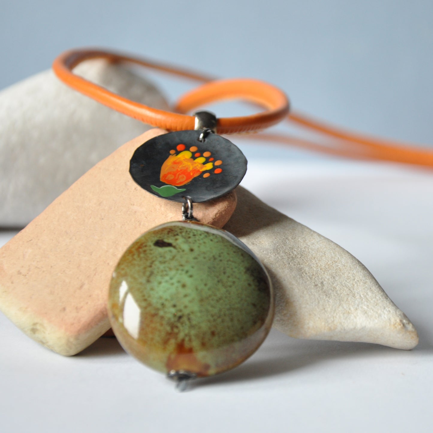 Necklace with decorative ceramic and copper pendant with enameled flower 'Pebble in the Garden'