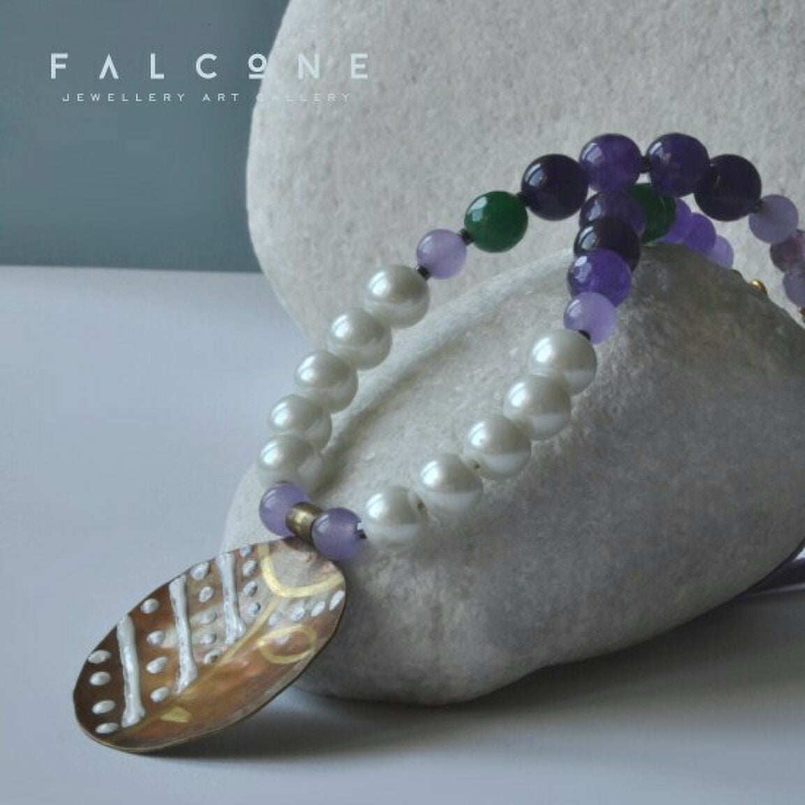 Necklace with engraved and enameled brass pendant, glass pearls and natural stones 'Africana in Purple'