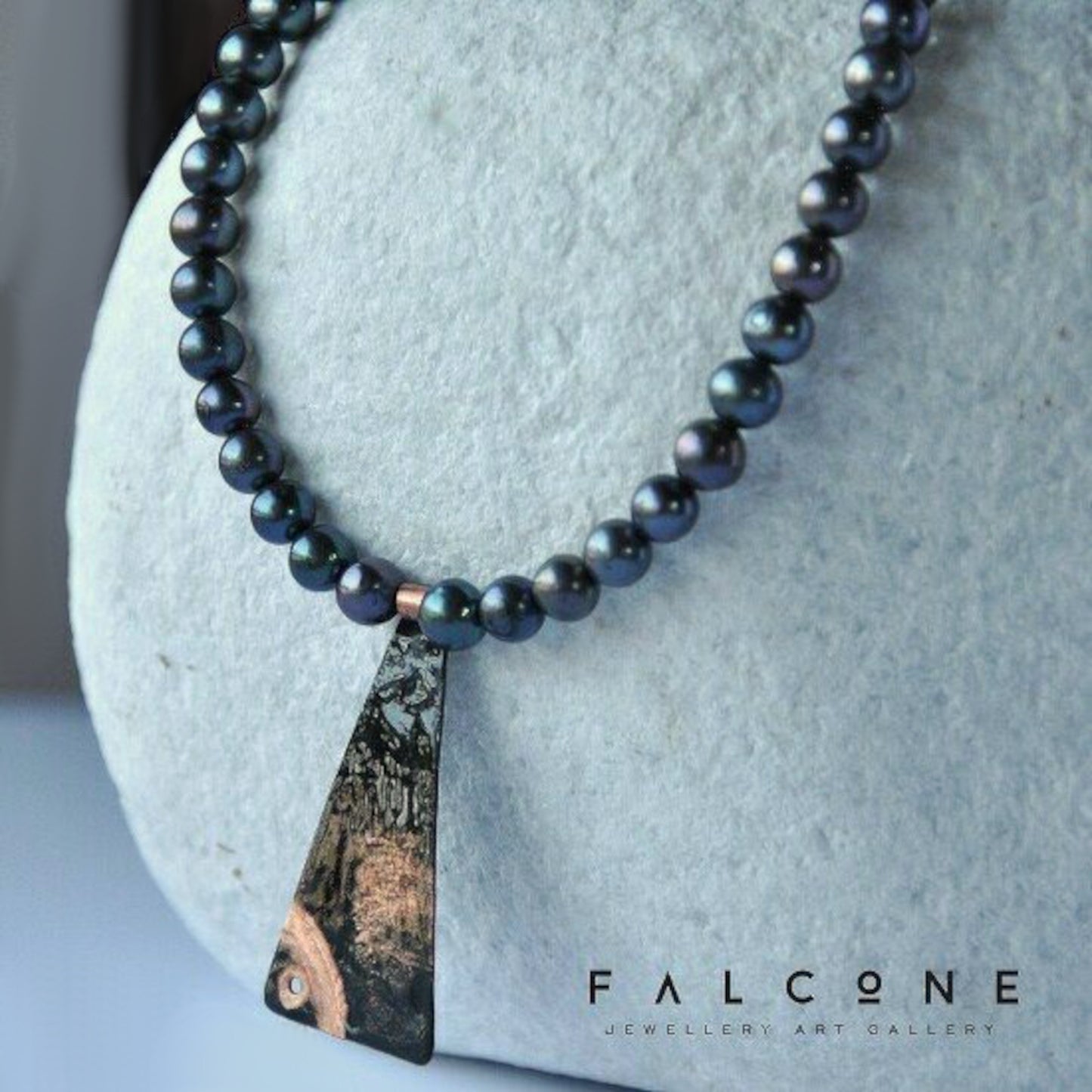 Necklace with a pendant of patinated copper and natural dark pearls 'Black Fish'