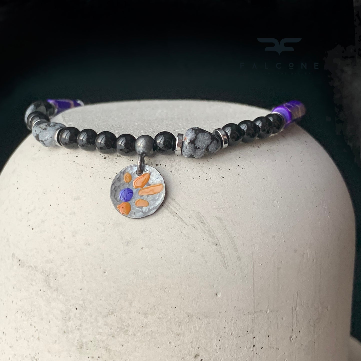 Bracelet of obsidian, imperial jasper and onyx with sterling silver enameled pendant 'Dalmatian with Flower'