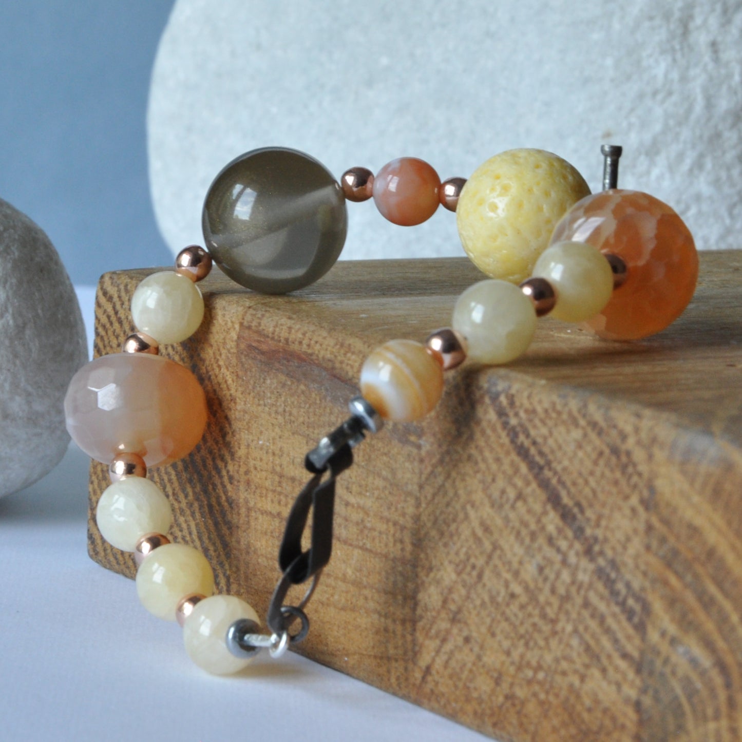 Bracelet with natural stones, coral and semi-transparent resin 'Sands of the Sahara'