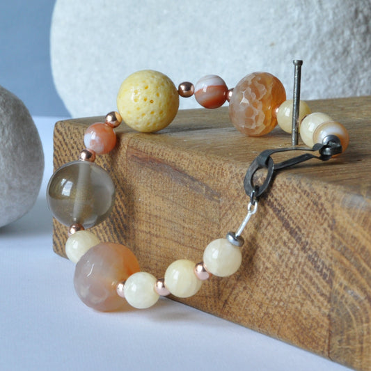 Bracelet with natural stones, coral and semi-transparent resin 'Sands of the Sahara'
