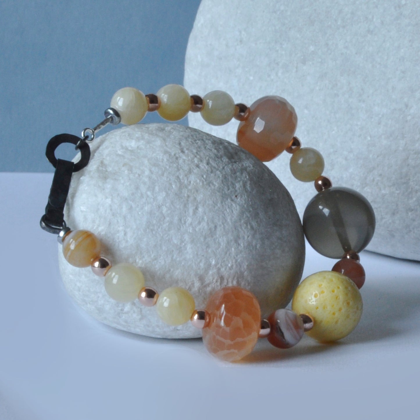 Bracelet with natural stones, coral and semi-transparent resin 'Sands of the Sahara'