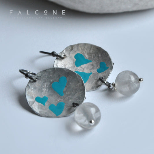 Hand forged aluminium enameled earrings in the shape of irregular circles and with hanging quartz 'Turquoise Hearts'