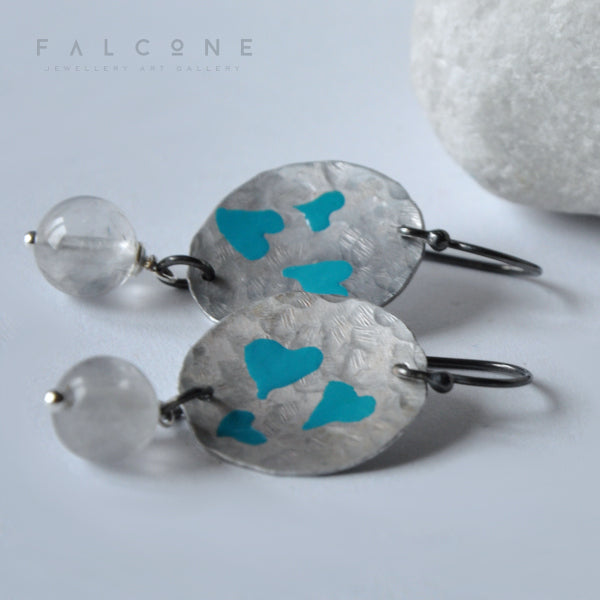 Hand forged aluminium enameled earrings in the shape of irregular circles and with hanging quartz 'Turquoise Hearts'