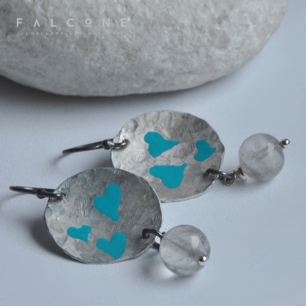 Hand forged aluminium enameled earrings in the shape of irregular circles and with hanging quartz 'Turquoise Hearts'
