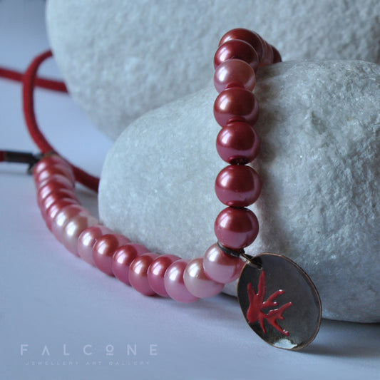 Long necklace of glass pearls with enameled brass pendant 'Coral'