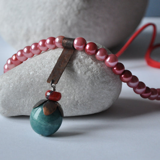 Necklace with a forged copper pendant, amazonite and glass pearls 'Flower with Amazonite'