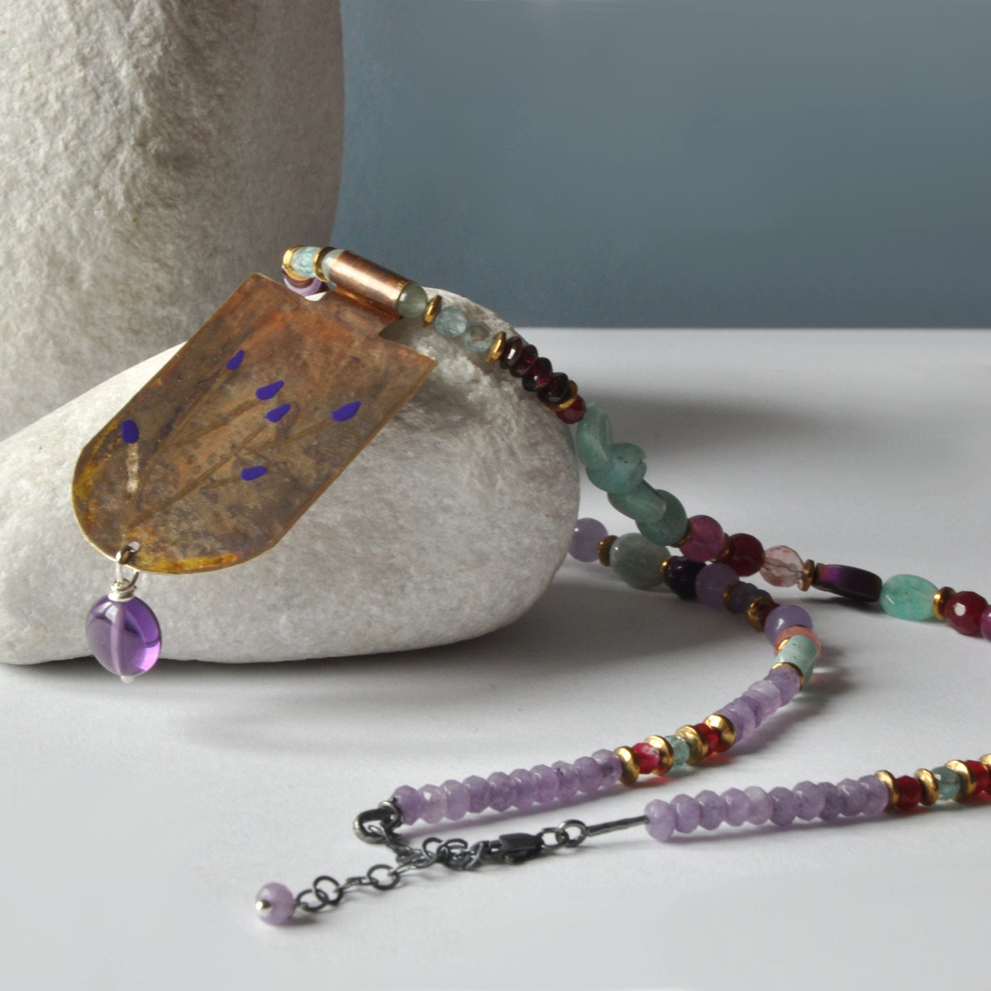 Necklace with engraved and enameled brass pendant and gemstones 'Secret Garden'