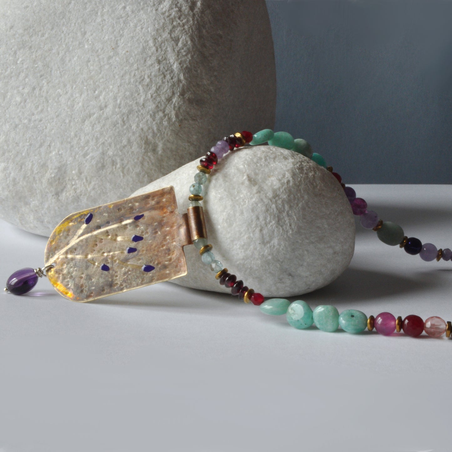 Necklace with engraved and enameled brass pendant and gemstones 'Secret Garden'
