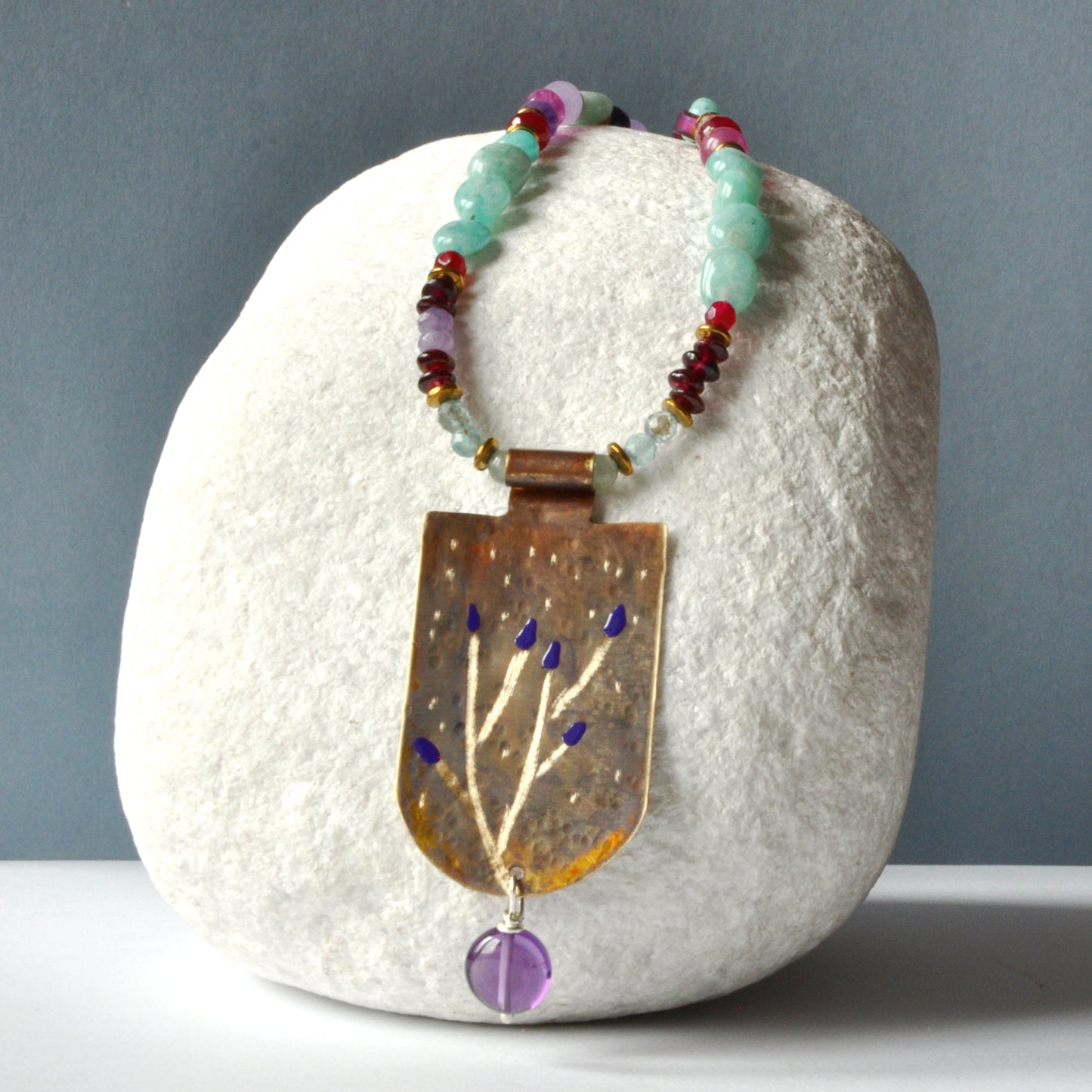 Necklace with engraved and enameled brass pendant and gemstones 'Secret Garden'
