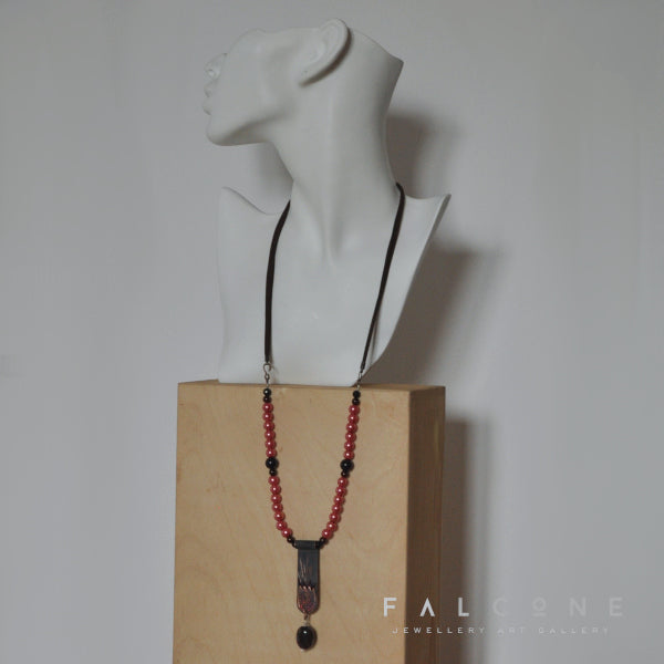 Long necklace with copper engraved pendant in tulip motif and silver elements 'Necklace with Tulip'