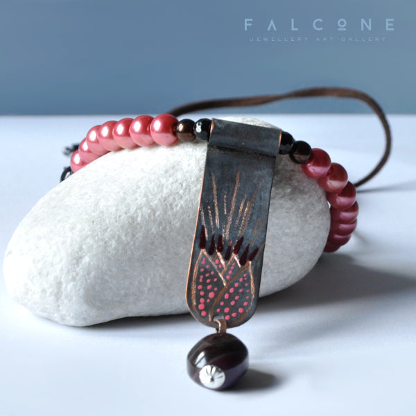 Long necklace with copper engraved pendant in tulip motif and silver elements 'Necklace with Tulip'