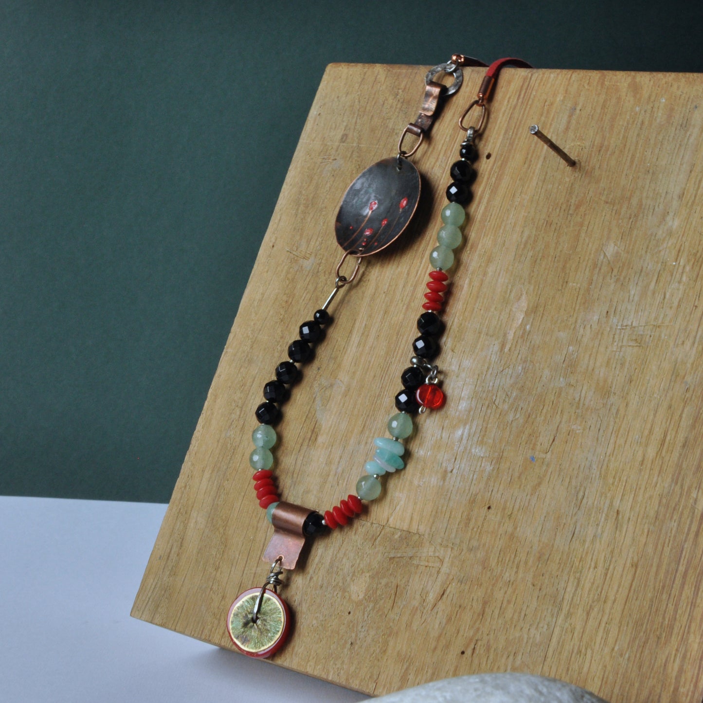 Long avant-garde necklace, made of silver, copper and brass and with gemstones 'A Patch of Meadow'