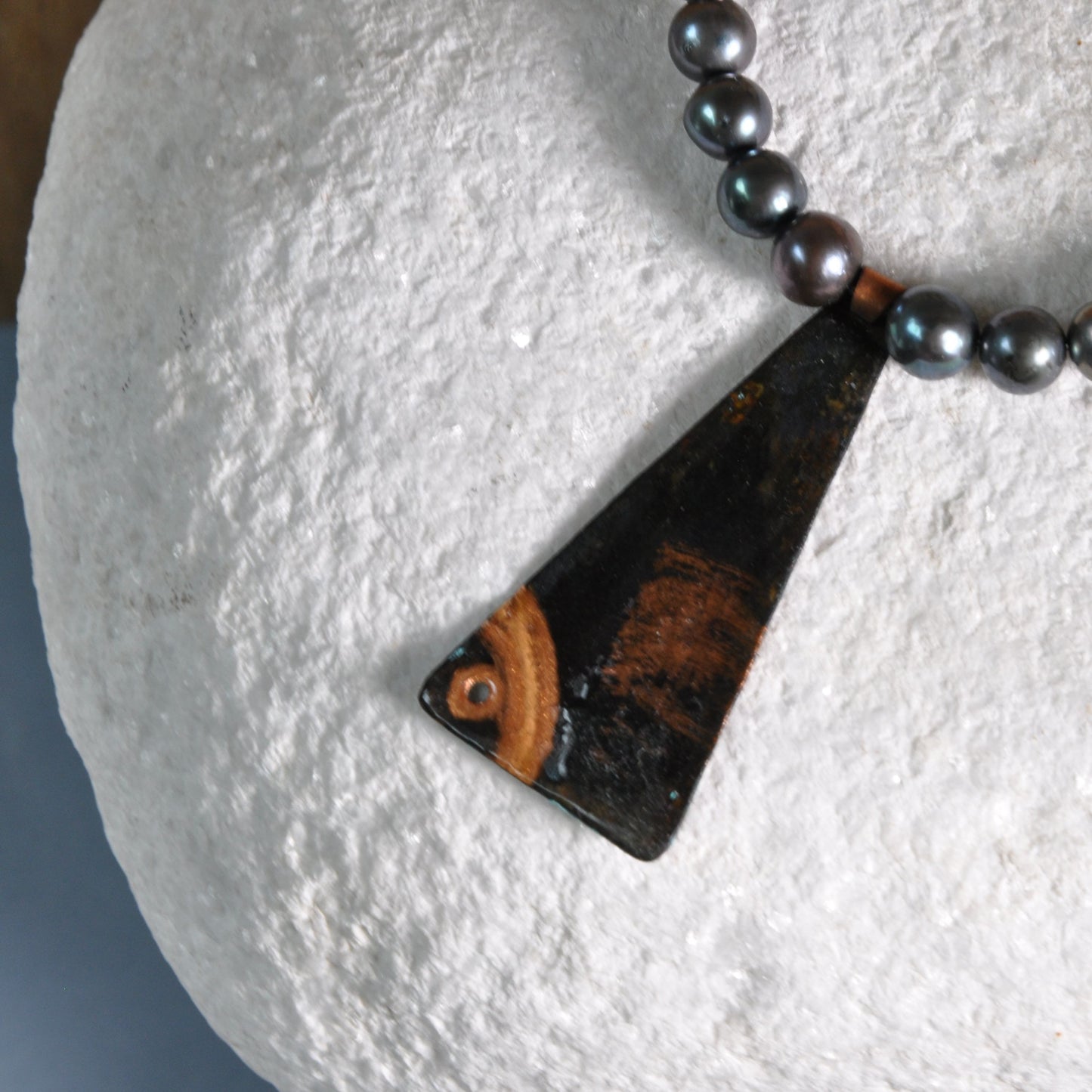 Necklace with a pendant of patinated copper and natural dark pearls 'Black Fish'