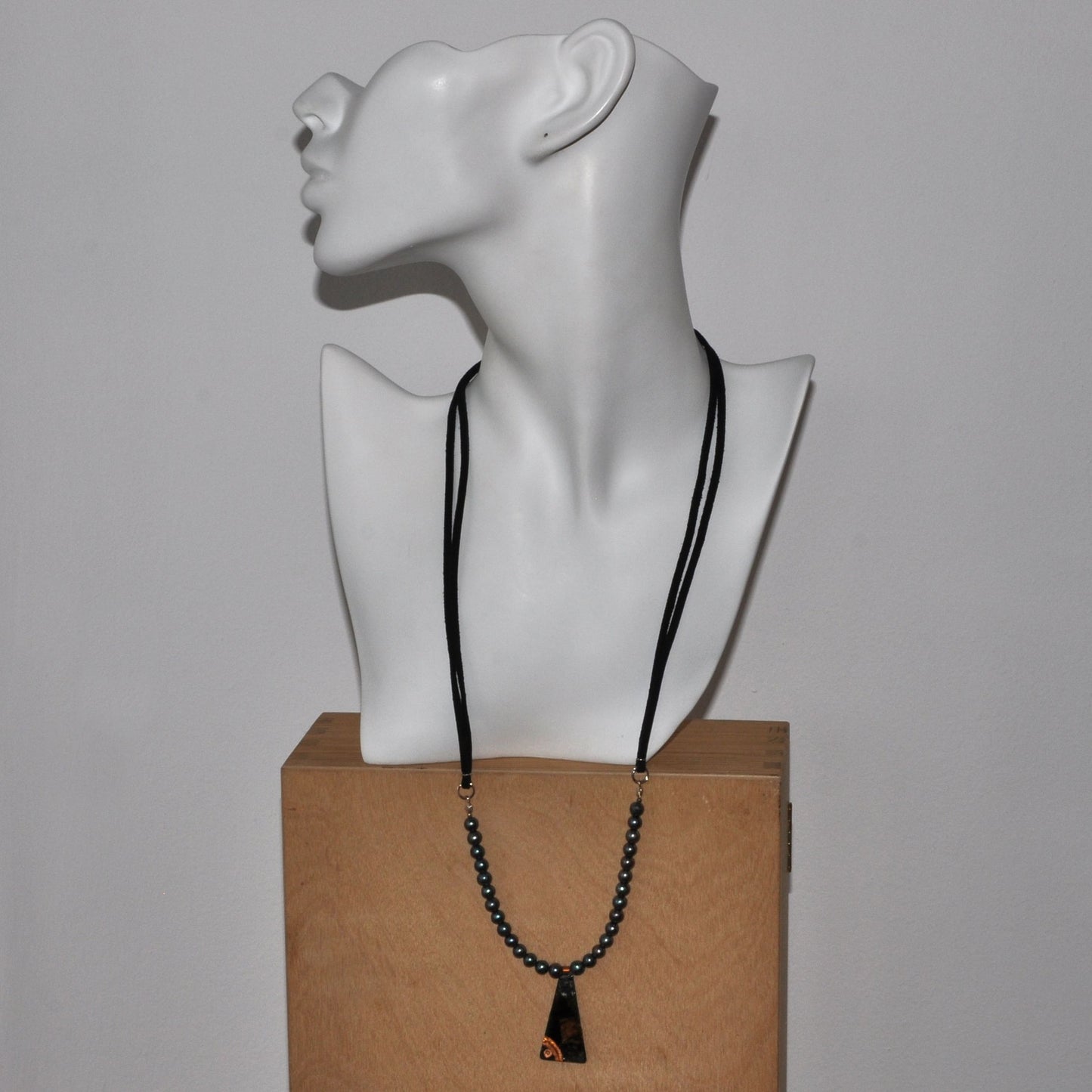 Necklace with a pendant of patinated copper and natural dark pearls 'Black Fish'