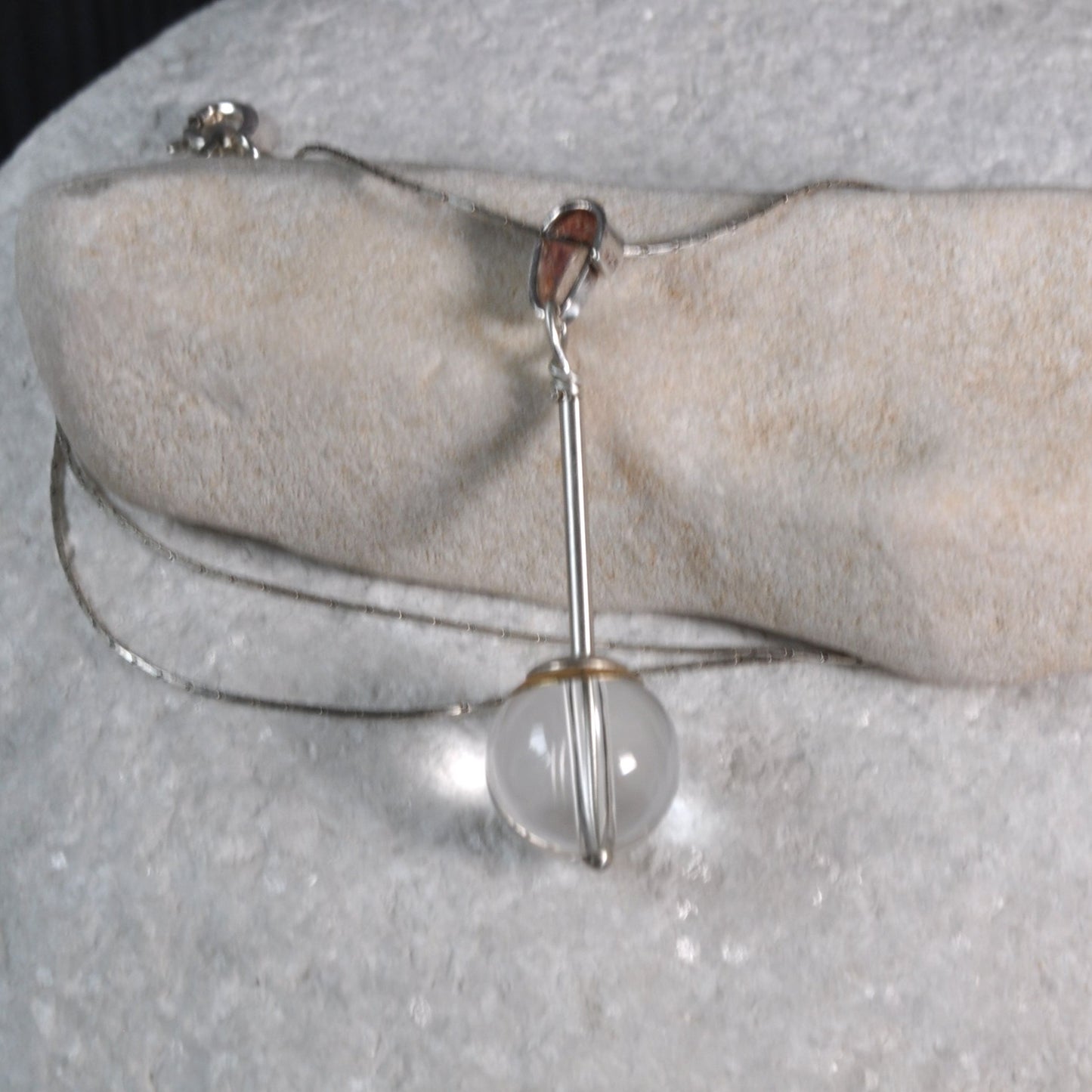 A subtle necklace with a rock crystal 'Pure'