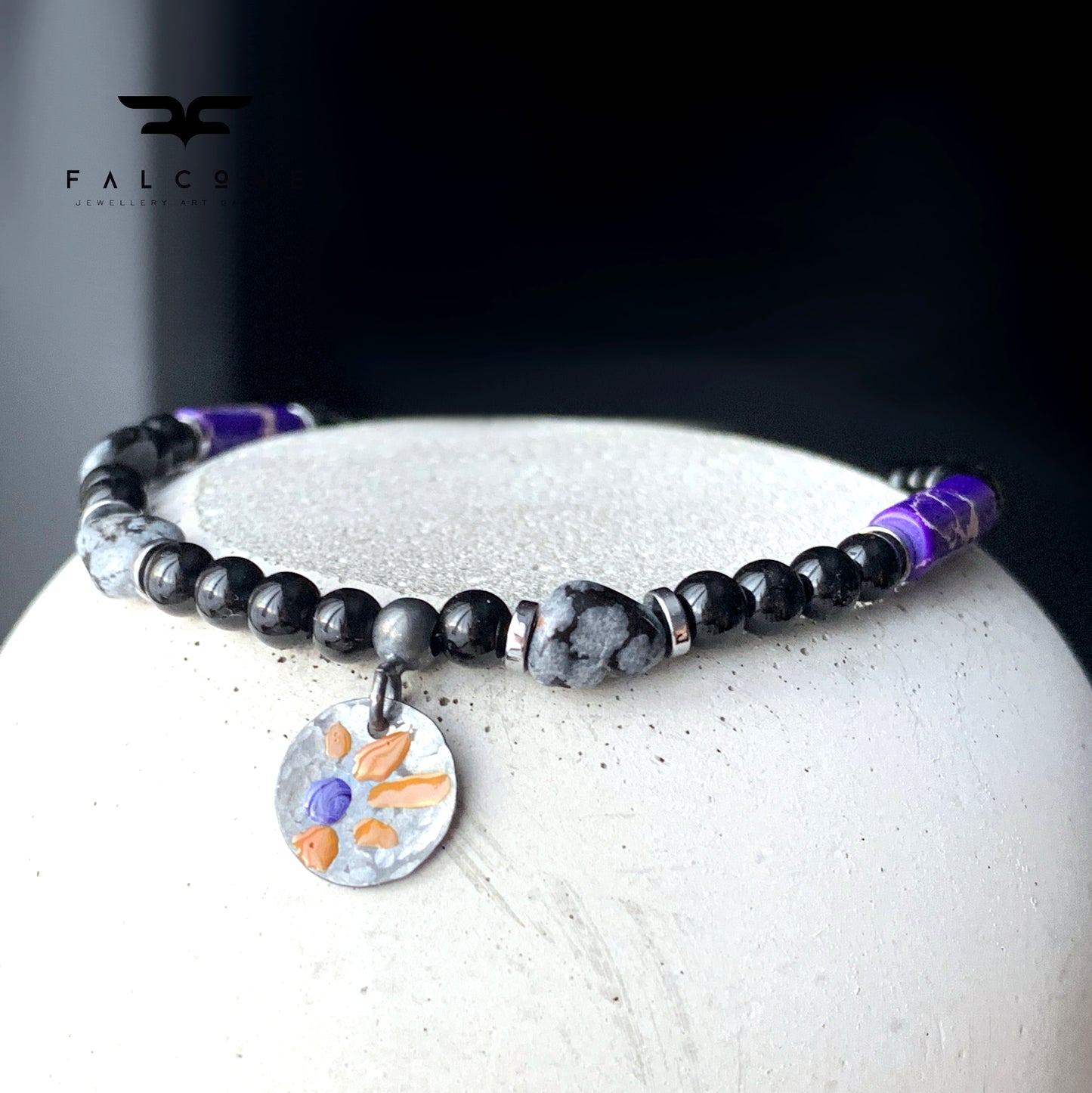 Bracelet of obsidian, imperial jasper and onyx with sterling silver enameled pendant 'Dalmatian with Flower'