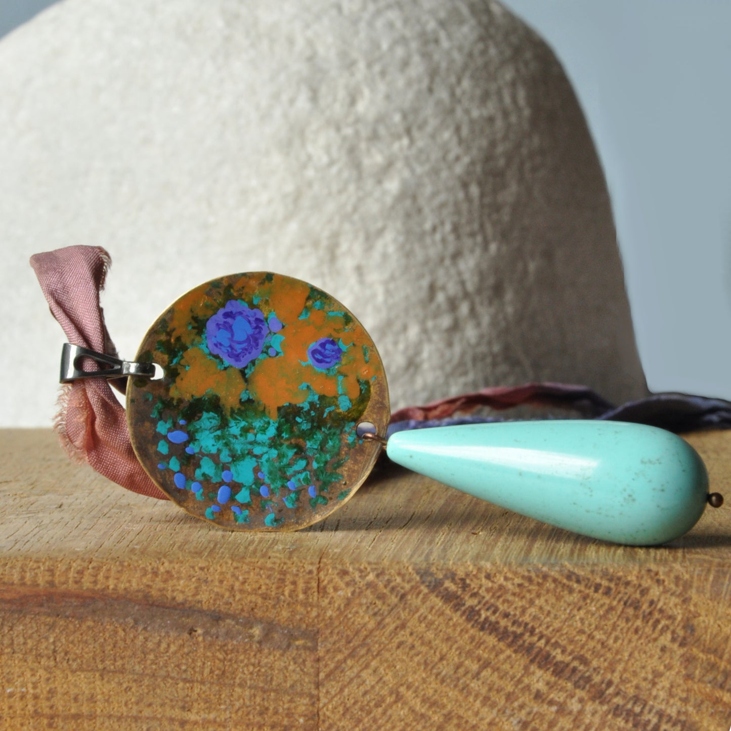 Raw silk necklace with a forged enameled brass pendant and a drop of howlite 'From the Studio Windows'