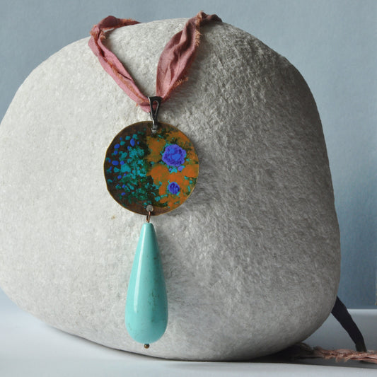 Raw silk necklace with a forged enameled brass pendant and a drop of howlite 'From the Studio Windows'