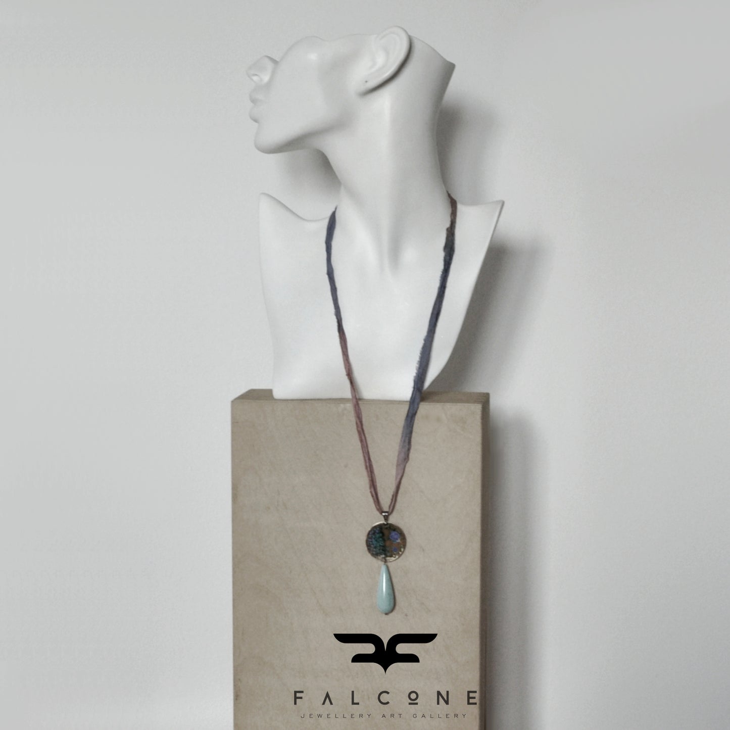 Raw silk necklace with a forged enameled brass pendant and a drop of howlite 'From the Studio Windows'