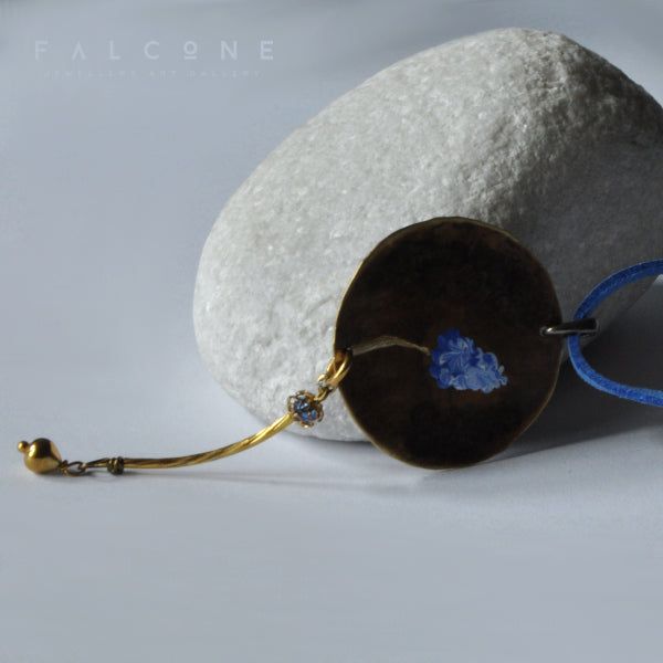 Gold and blue necklace with brass pendant and Swarovski crystal 'Hyacinth'
