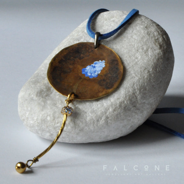 Gold and blue necklace with brass pendant and Swarovski crystal 'Hyacinth'