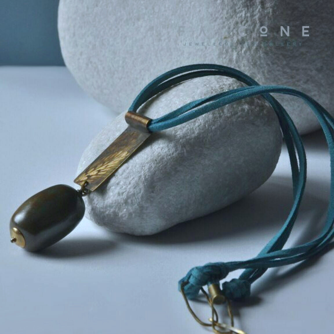 Long necklace with a brass engraved pendant & thermal olive 'With an Ear of Grain'