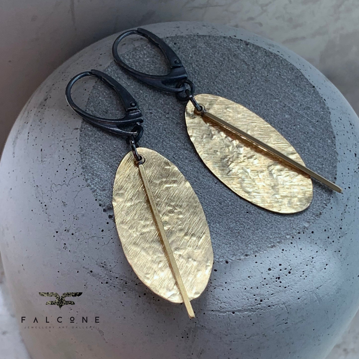 Earrings of raw brass and silver 'Gold Leaves'