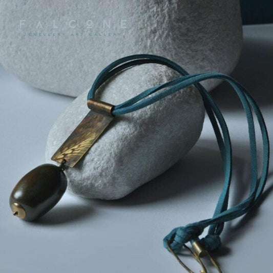 Long necklace with a brass engraved pendant & thermal olive 'With an Ear of Grain'
