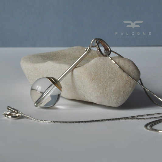 A subtle necklace with a rock crystal 'Pure'