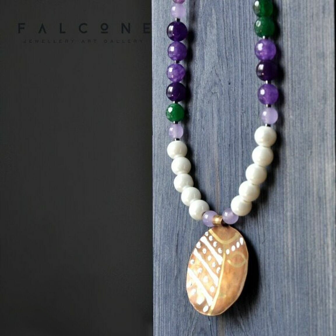 Necklace with engraved and enameled brass pendant, glass pearls and natural stones 'Africana in Purple'