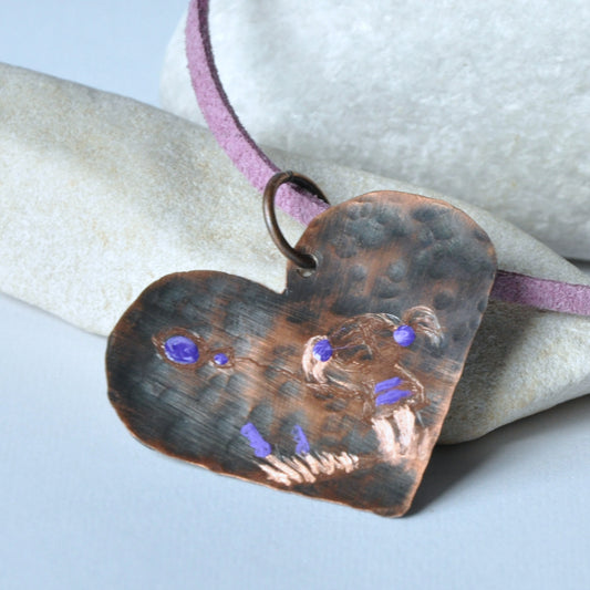 Copper pendant, engraved and enameled 'Struggling with the wind'