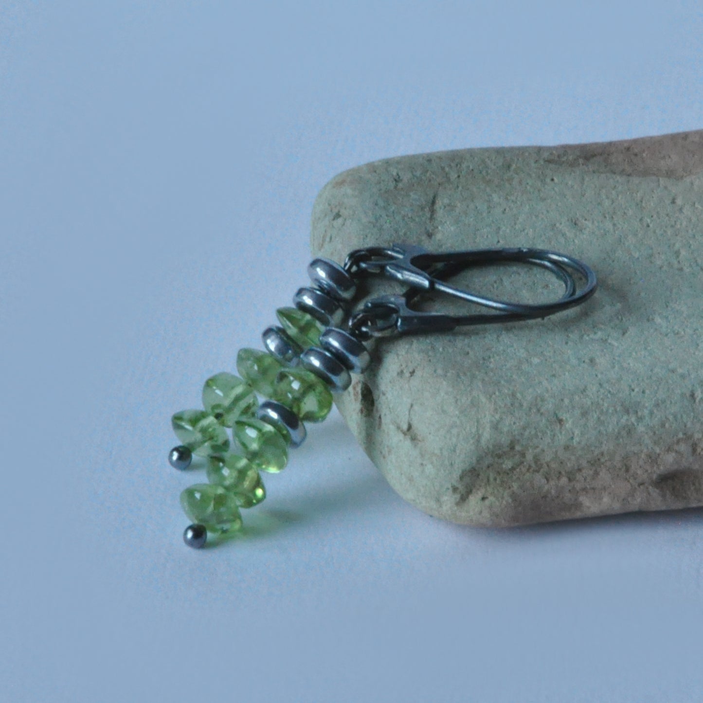 Green earrings with silver, peridots and rondelles of plated hematite 'With Green Peridots'