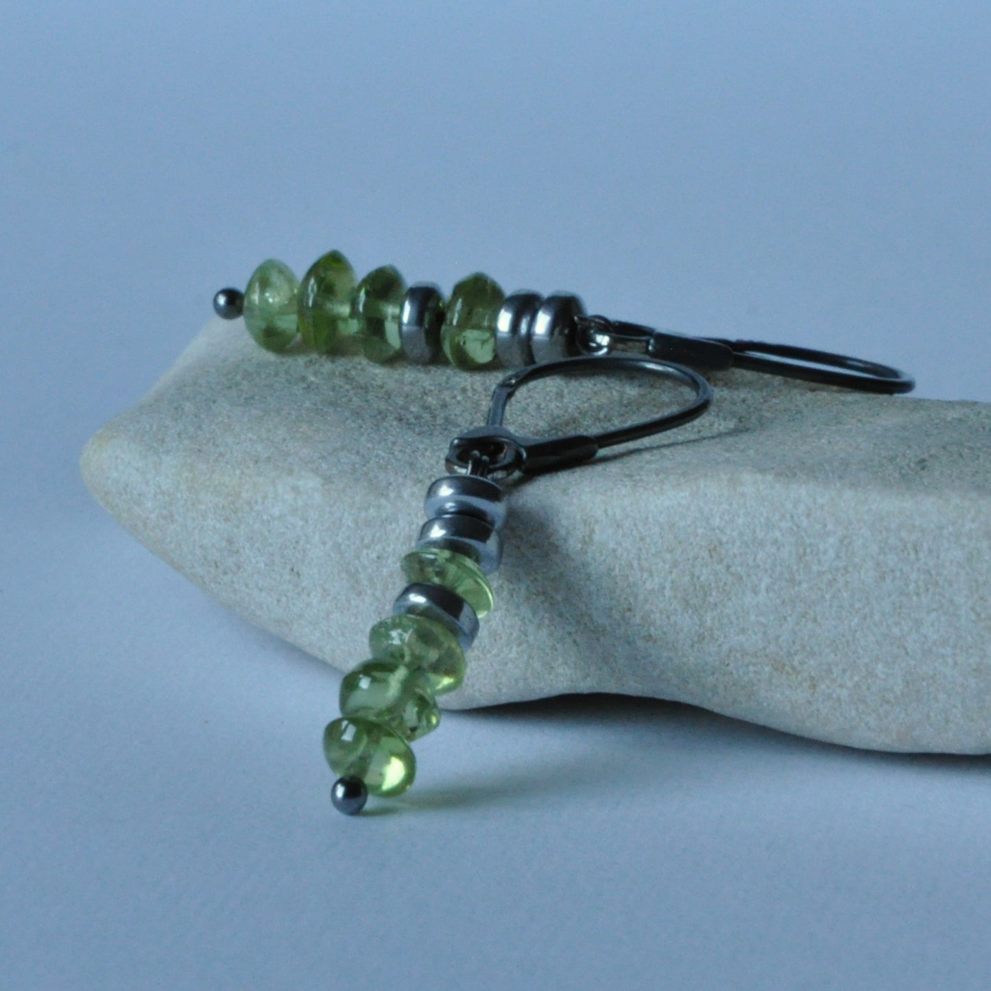 Green earrings with silver, peridots and rondelles of plated hematite 'With Green Peridots'