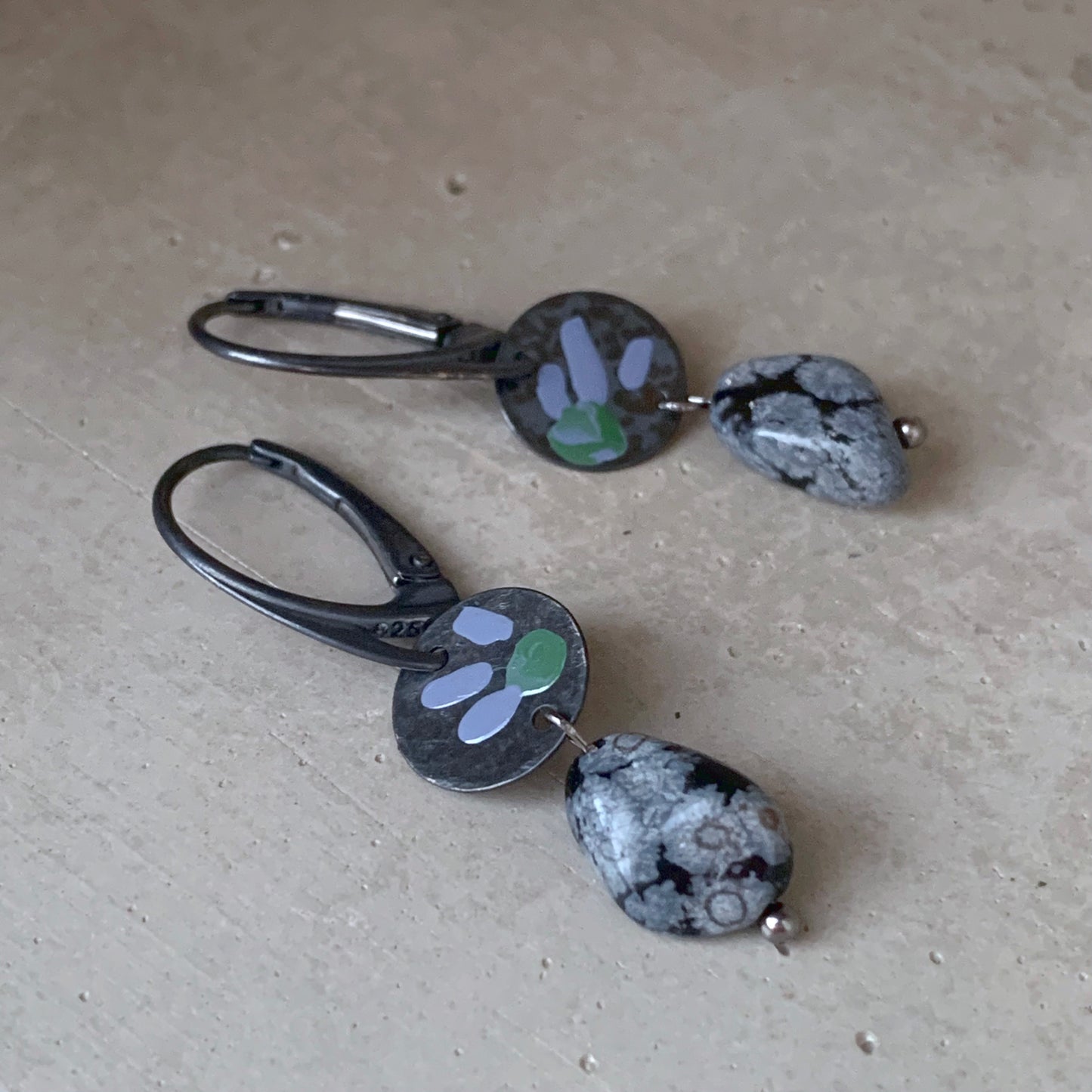 Earrings in silver and obsidian, with hand-enameled flowers 'Dalmatians on the Heath'