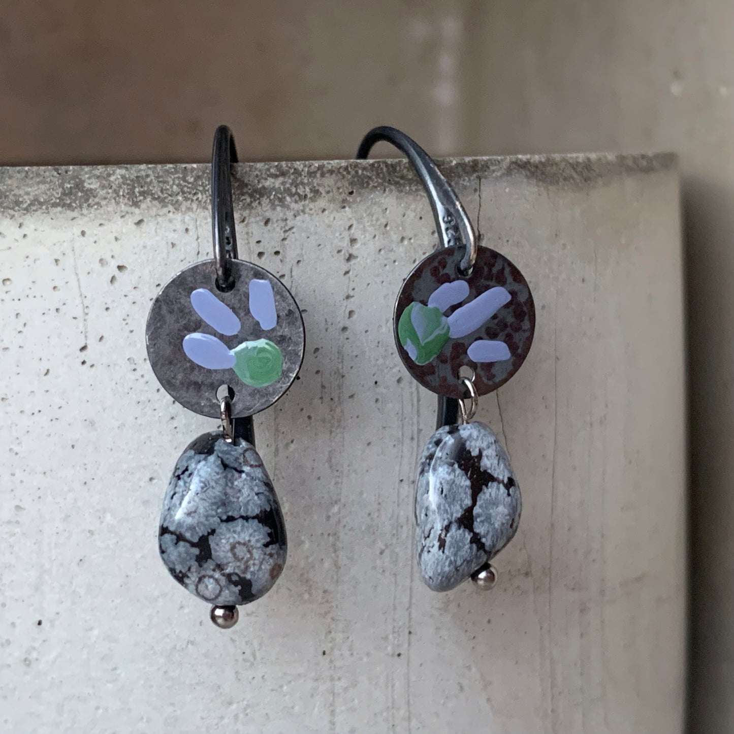 Earrings in silver and obsidian, with hand-enameled flowers 'Dalmatians on the Heath'