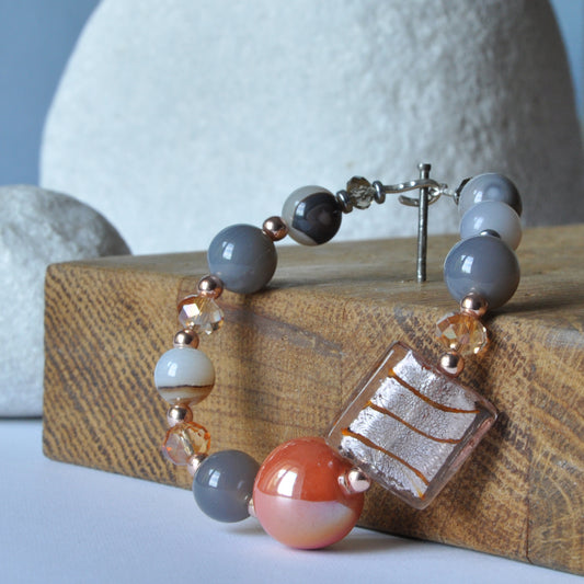 Silver bracelet with plated hematite, Venetian glass, ceramic ball and agates 'Grey with Honey'