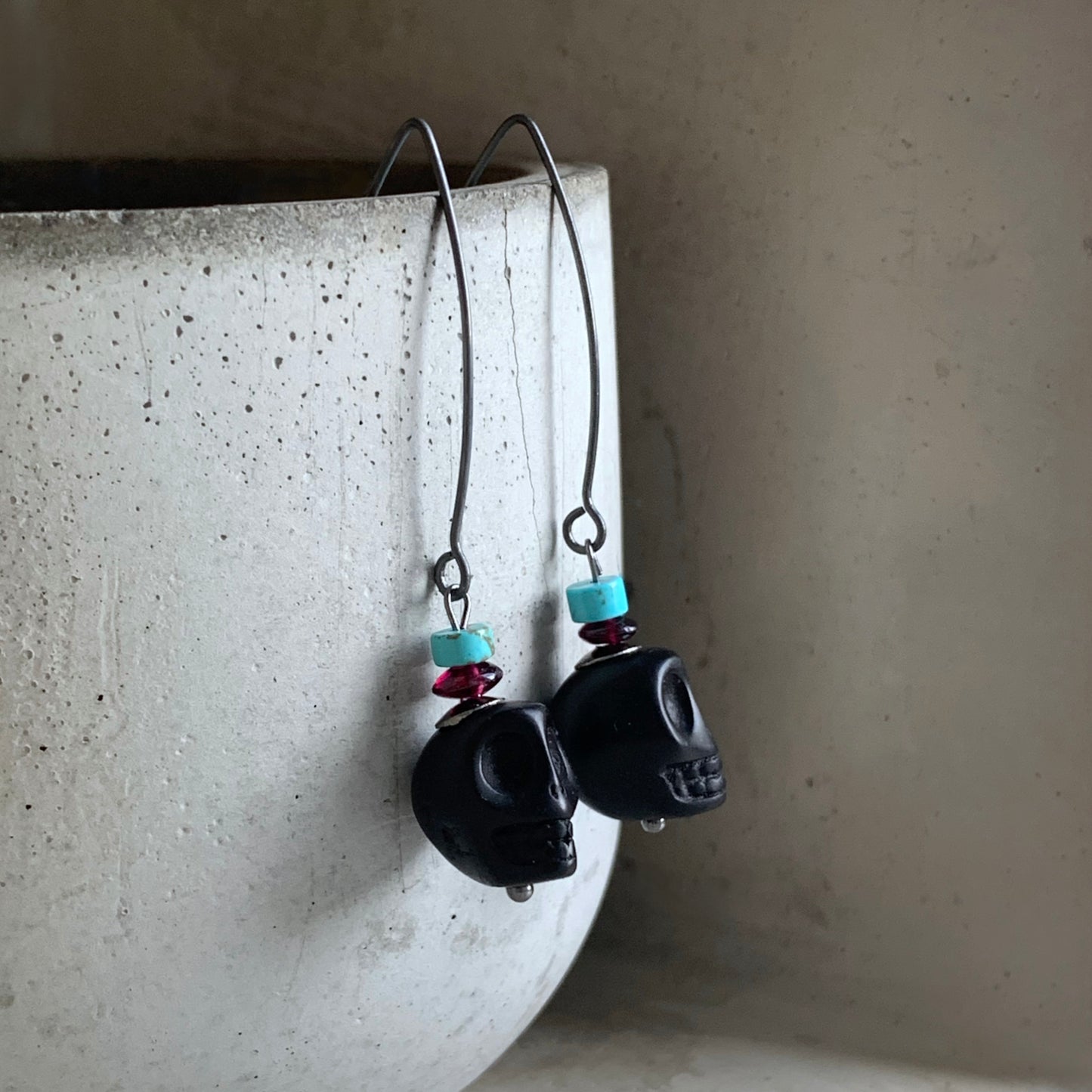 Silver Earrings with Carved Howlite, Turquoise, and Garnet 'La Muerte'