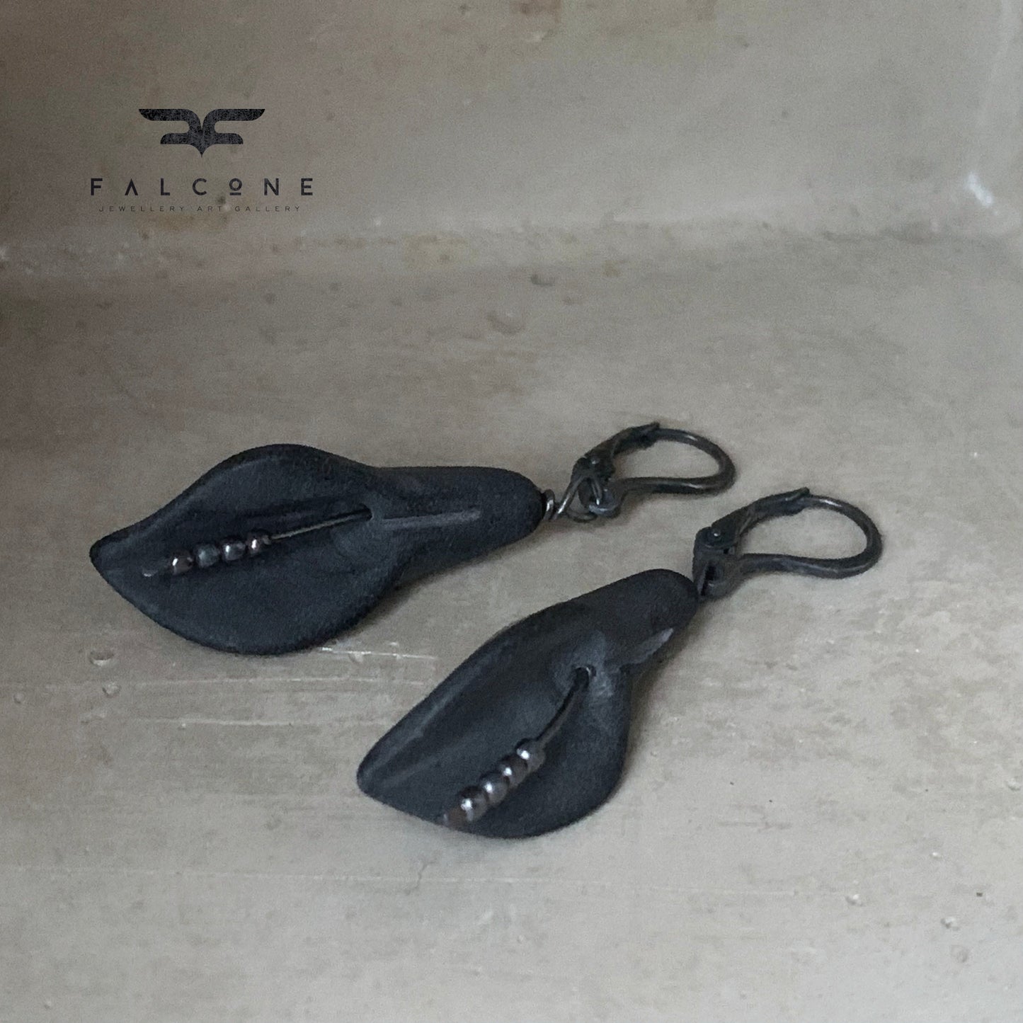 Silver earrings with carved Black Stone 'Black Callas'