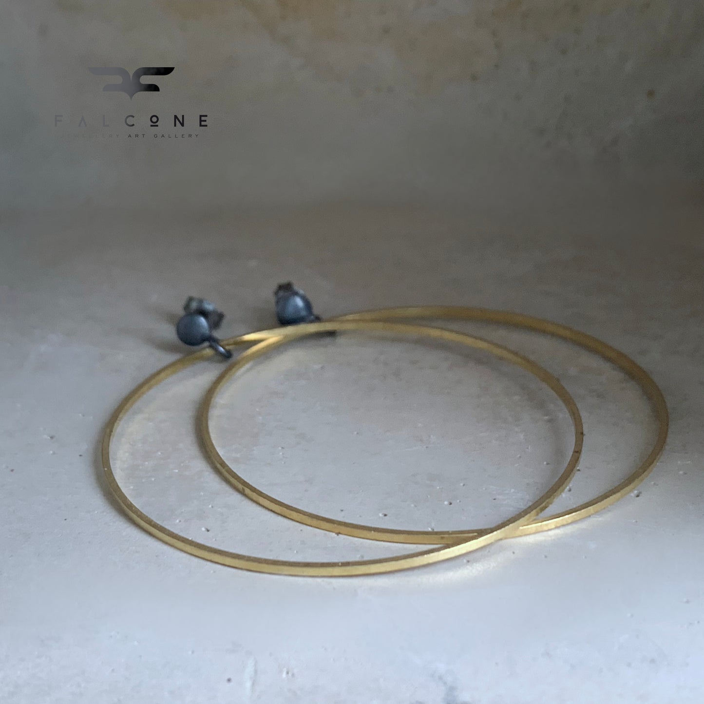 Hoop earrings made of brass and silver 'Golden Circles'