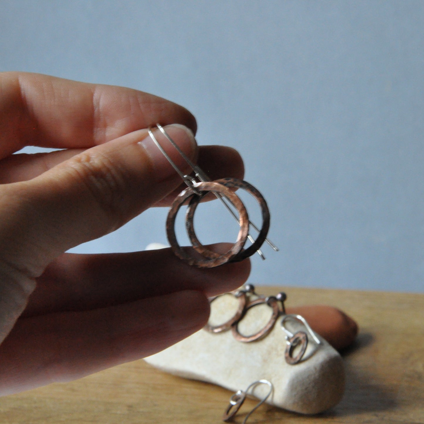 Circle copper earrings with silver earwires 'Brick raw copper'