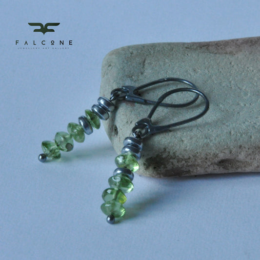 Green earrings with silver, peridots and rondelles of plated hematite 'With Green Peridots'