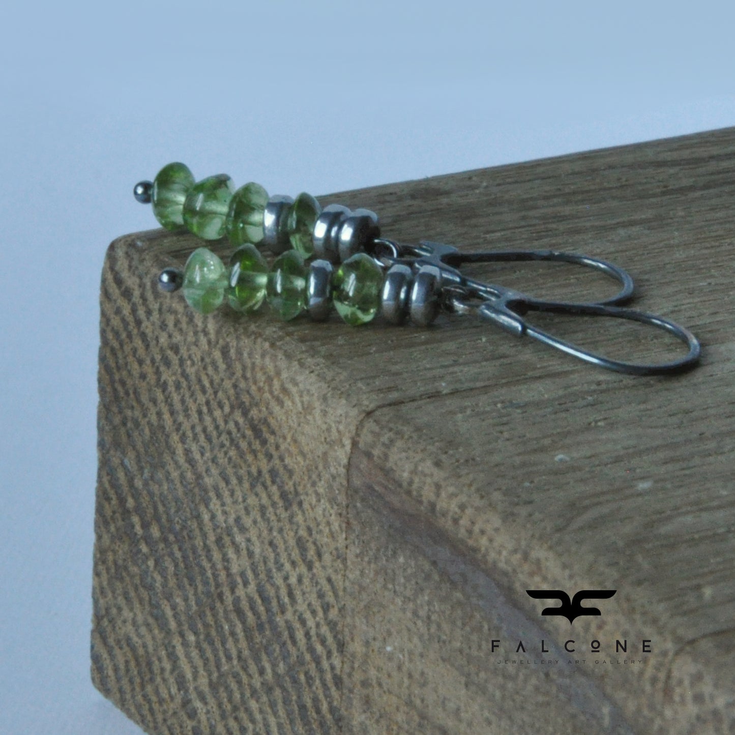 Green earrings with silver, peridots and rondelles of plated hematite 'With Green Peridots'