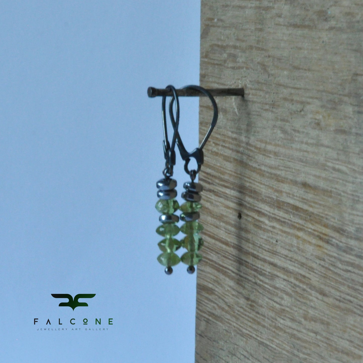 Green earrings with silver, peridots and rondelles of plated hematite 'With Green Peridots'