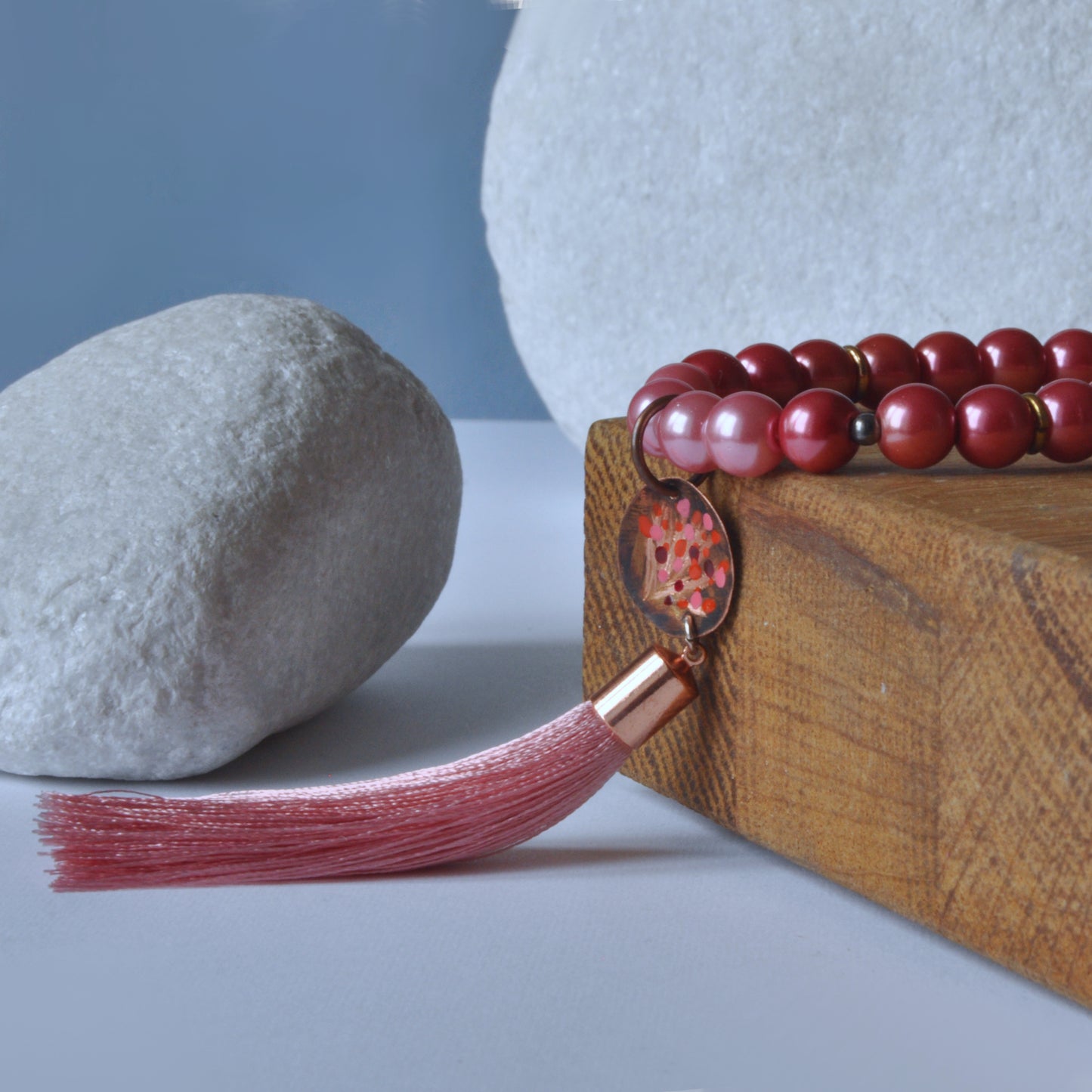 Long necklace with glass pearls and forged and enameled copper pendant 'Powder Pink with Tassel'