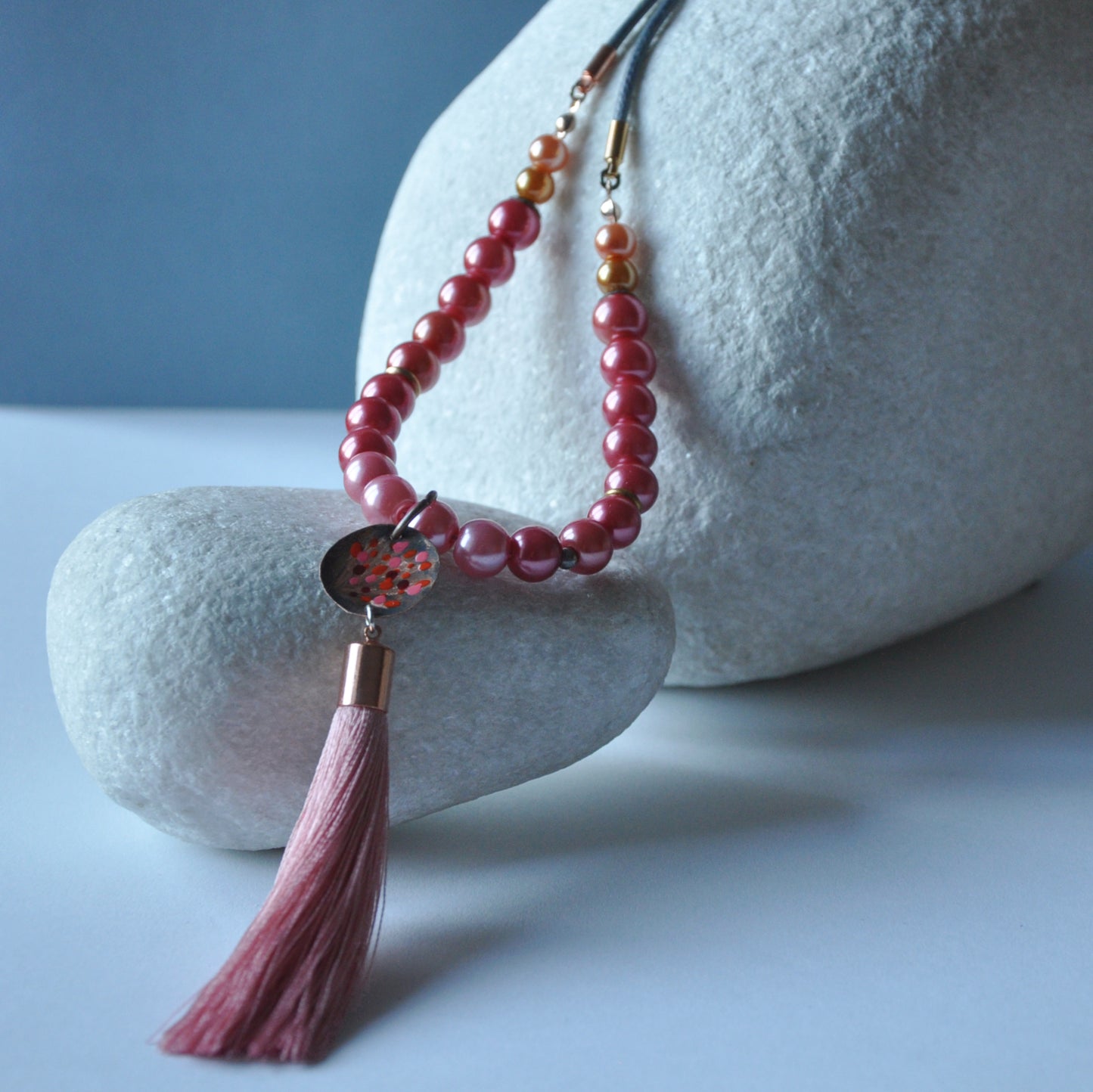 Long necklace with glass pearls and forged and enameled copper pendant 'Powder Pink with Tassel'