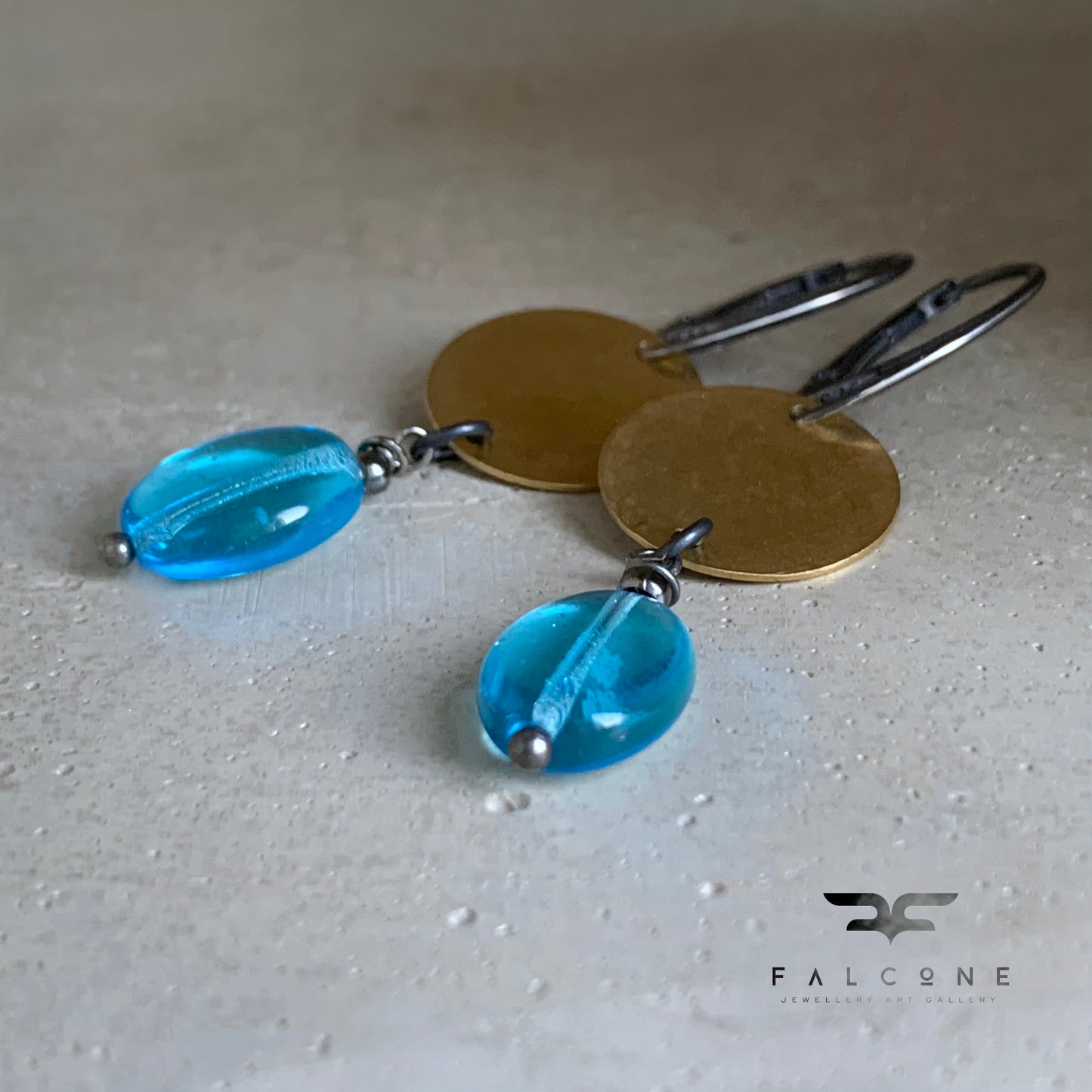 Earrings made of brass, silver, and glass 'Behind the Clouds'