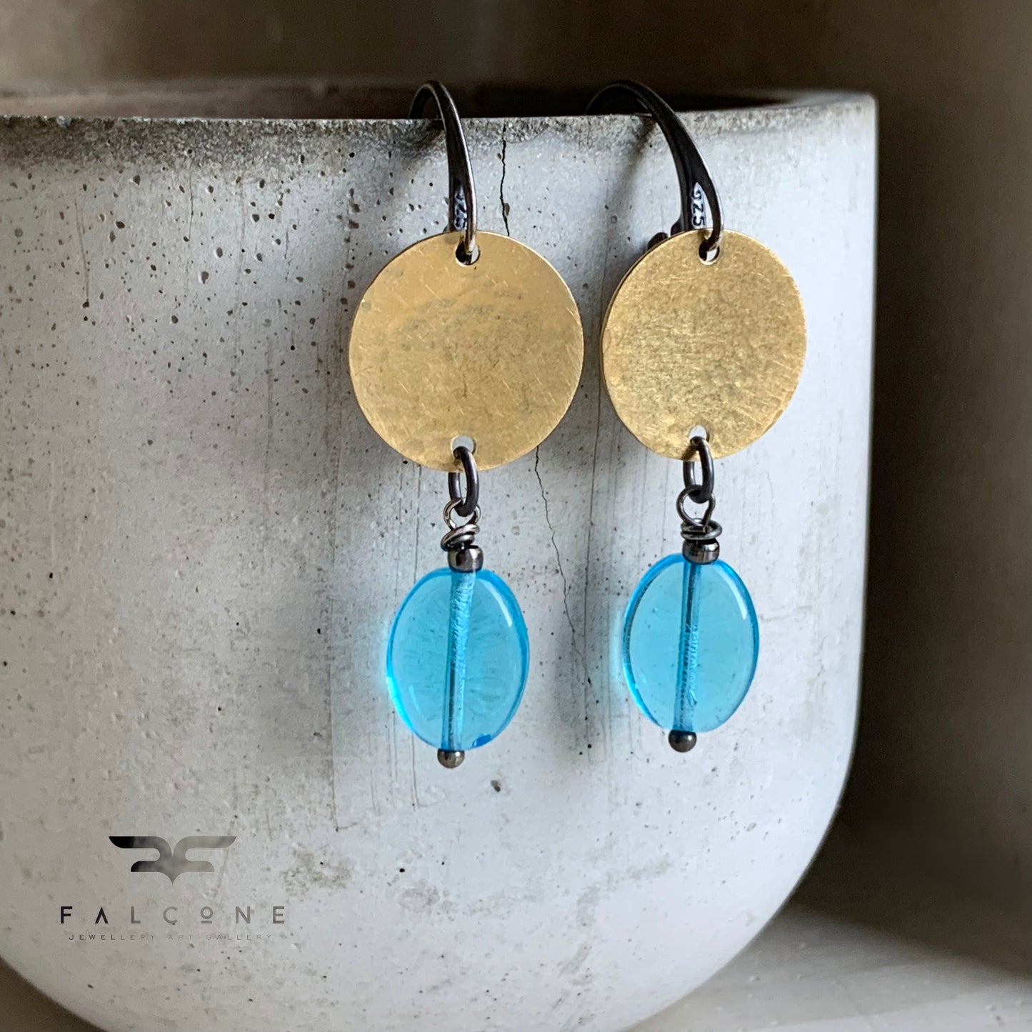 Earrings made of brass, silver, and glass 'Behind the Clouds'